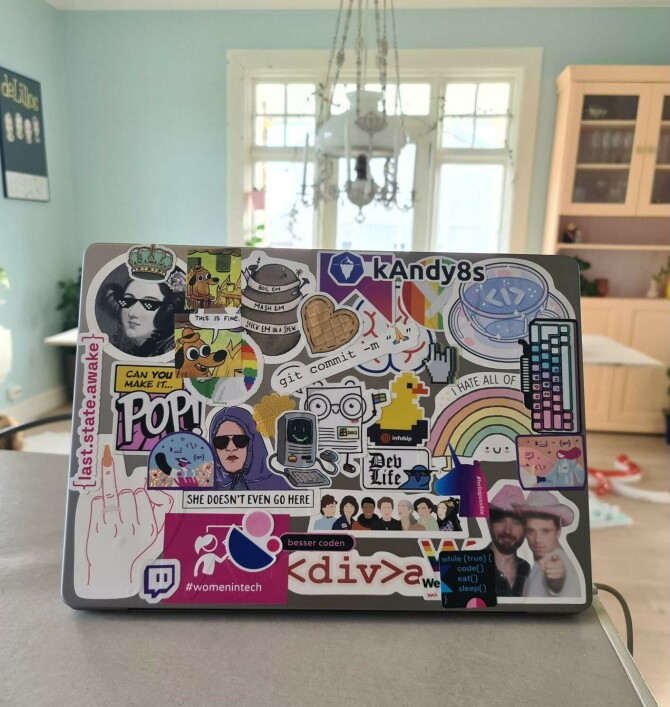 "Be-stickered laptop."